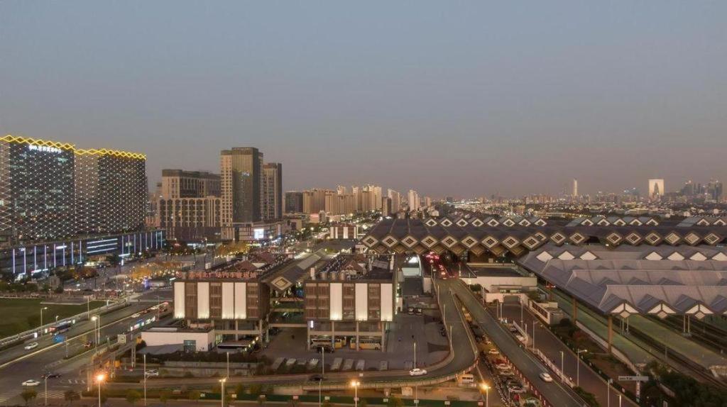 فندق جرين تري إن إكسبريس سوتشو ريلواي ستيشن نورث سكوير هاوباينيان ويدينج دريس سيتي سوجو المظهر الخارجي الصورة