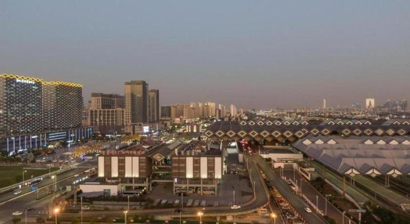 فندق جرين تري إن إكسبريس سوتشو ريلواي ستيشن نورث سكوير هاوباينيان ويدينج دريس سيتي سوجو المظهر الخارجي الصورة